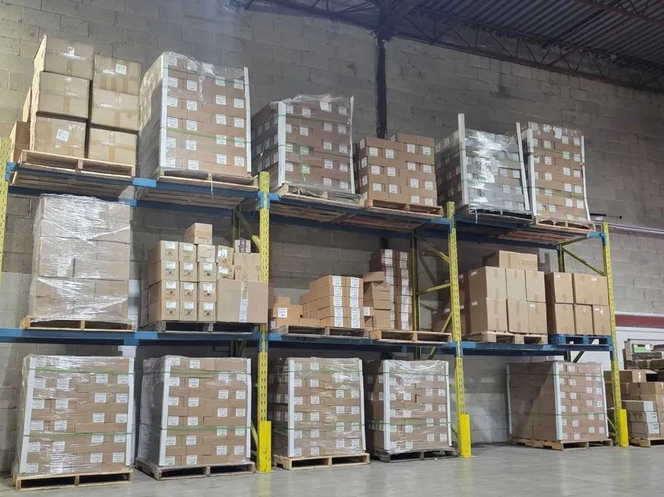 Pallets of boxes on racking in the RedHat Prep warehouse in Milton, Ontario
